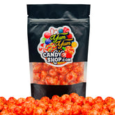 Front view of an 8oz bag of Chamoy Piña Colada Sours from Yum Yum Candy Shop, tropical pineapple and coconut flavor coated in tangy chamoy.