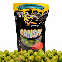 Yum Yum Candy Shop bag of green candy with visible text and branding.