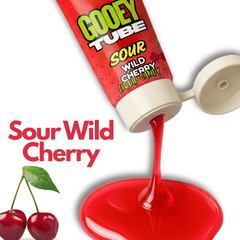 Sour wild cherry candy tube with red gooey substance spilling out, cherry graphics on a white background.