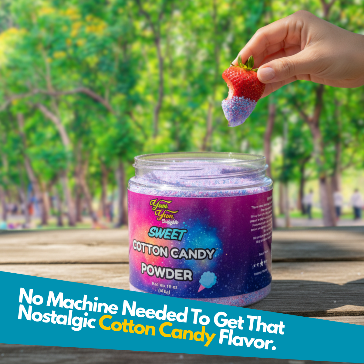 Strawberry dipped in cotton candy dipping powder above a jar of sweet cotton candy powder outdoors