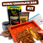 Dubai Chocolate Bar Kit from Yum Yum Candy Shop showing chocolate mold, chocolate pieces, pistachio spread, kataifi, and instruction sheet