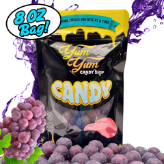 Yum Yum Candy Shop candy bag with purple candy and grapes on a white background