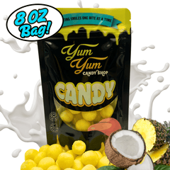 Yum Yum Candy Shop candy package with yellow candies, coconut, and pineapple on a white background.