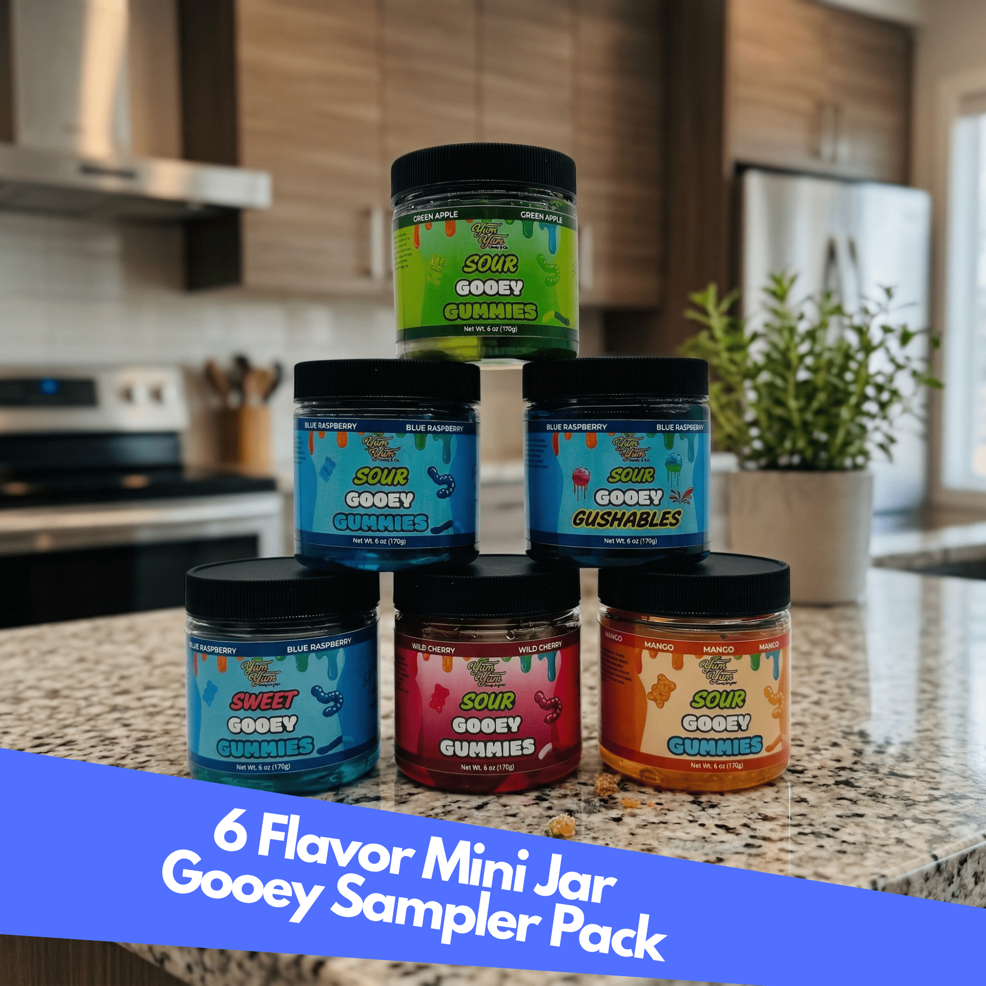 Collection of 6 mini jars with colorful labels on a kitchen counter.