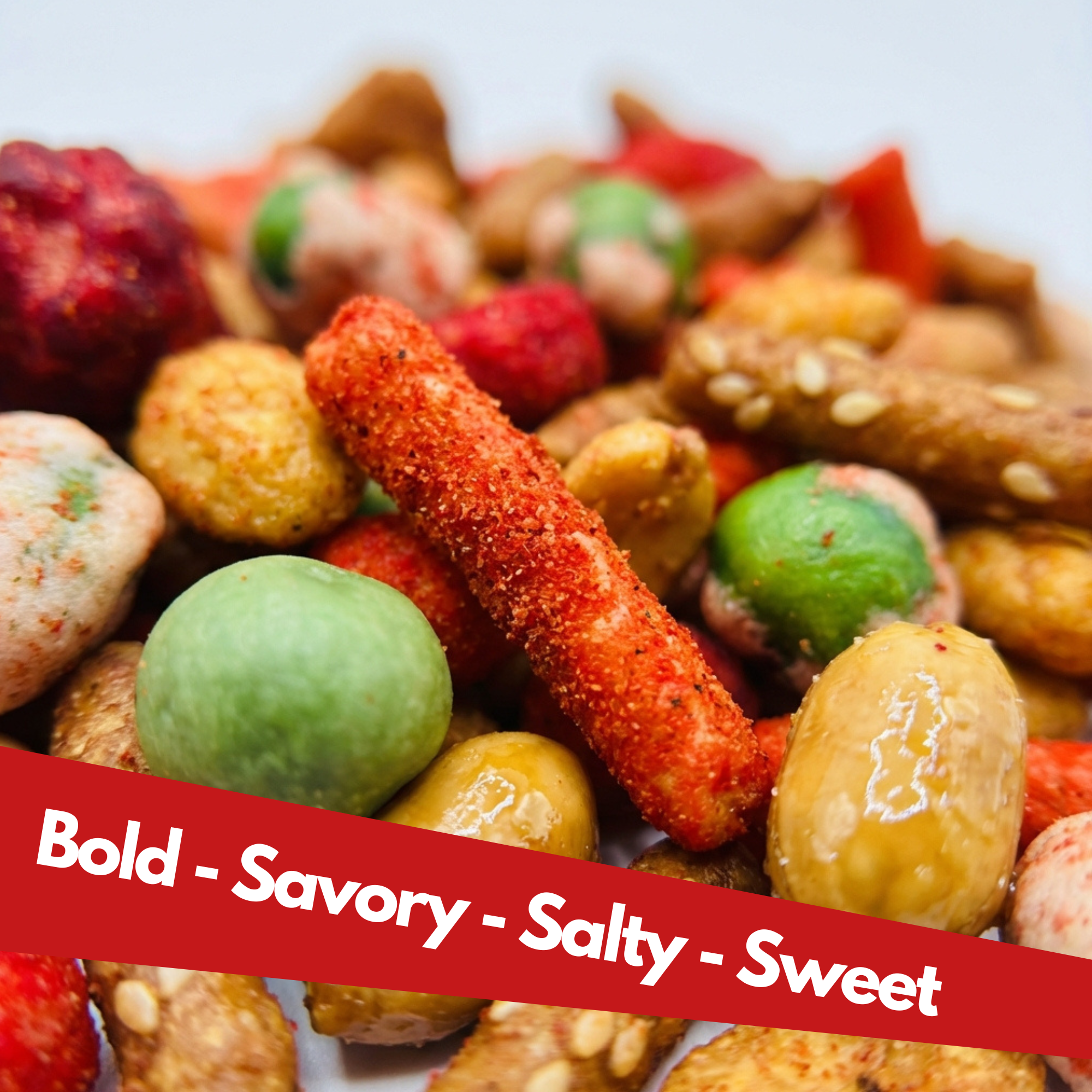 Close-up of Hot Honey Snack Mix showing sweet, spicy, savory blend with corn sticks, coated peanuts, and bold seasoning