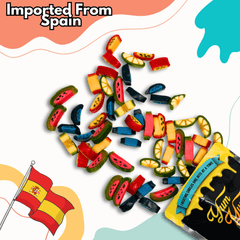 Colorful toy fruit pieces with a Spanish flag and 'Imported From Spain' text on a white background.