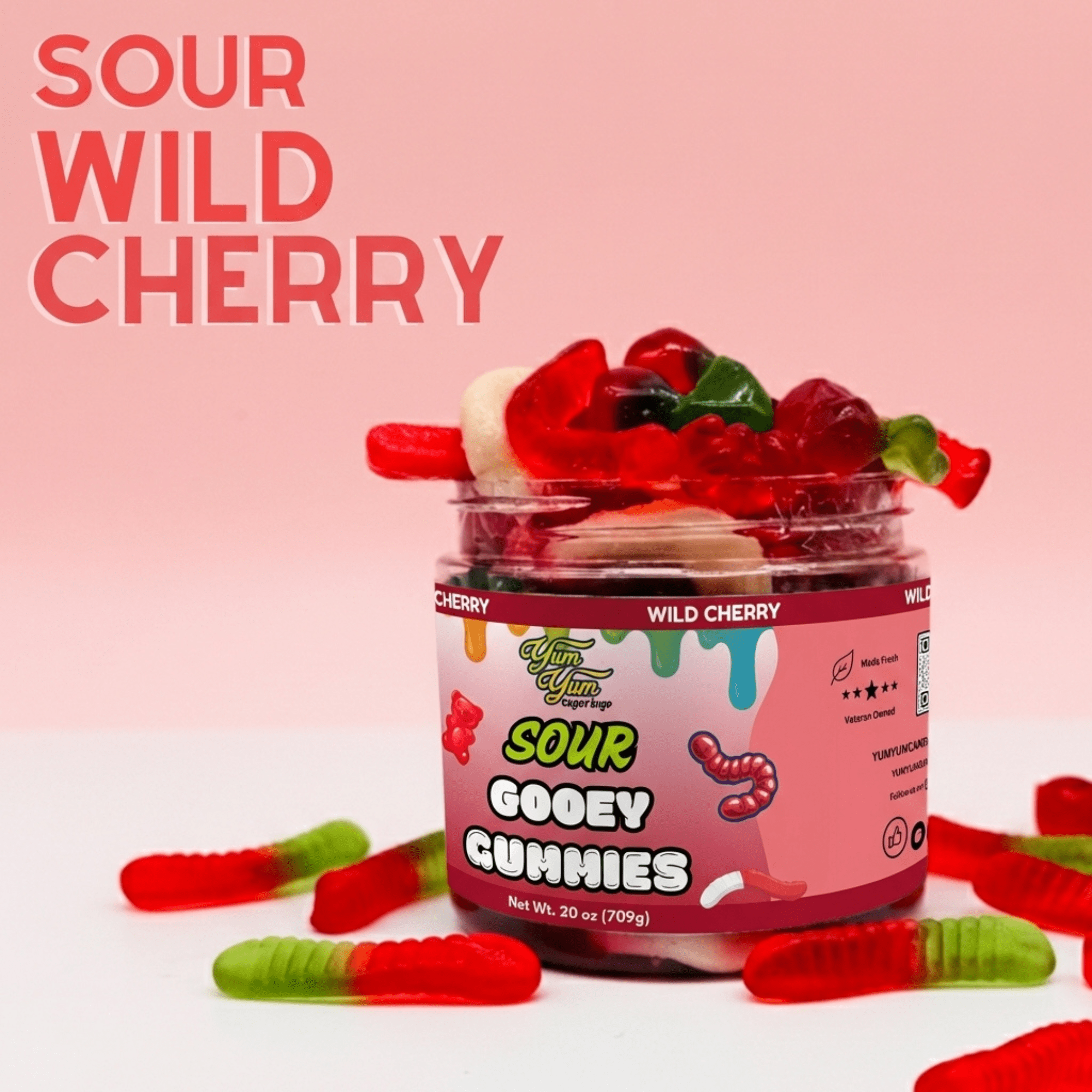 Jar of 'Gooey Gummies' surrounded by green and red gummy candy on a pink background