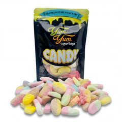 Black Yum Yum Candy bag filled with and surrounded by Swedish gummies
