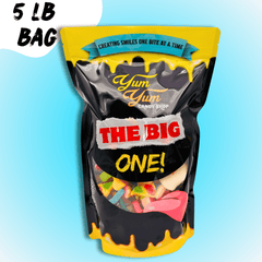 Yum Yum Candy Shop 'The Big One!' candy bag with colorful candies on a blue background