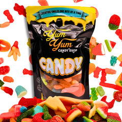 Yum Yum Candy Shop Pick & Mix Gummy Variety Bag surrounded by colorful gummy worms, bears, and fruit shapes.