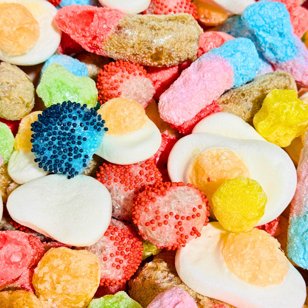 Colorful mix of assorted freeze dried gummies candy pieces