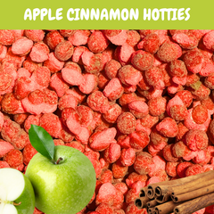 Red freeze dried apple cinnamon hotties with green apples and cinnamon sticks