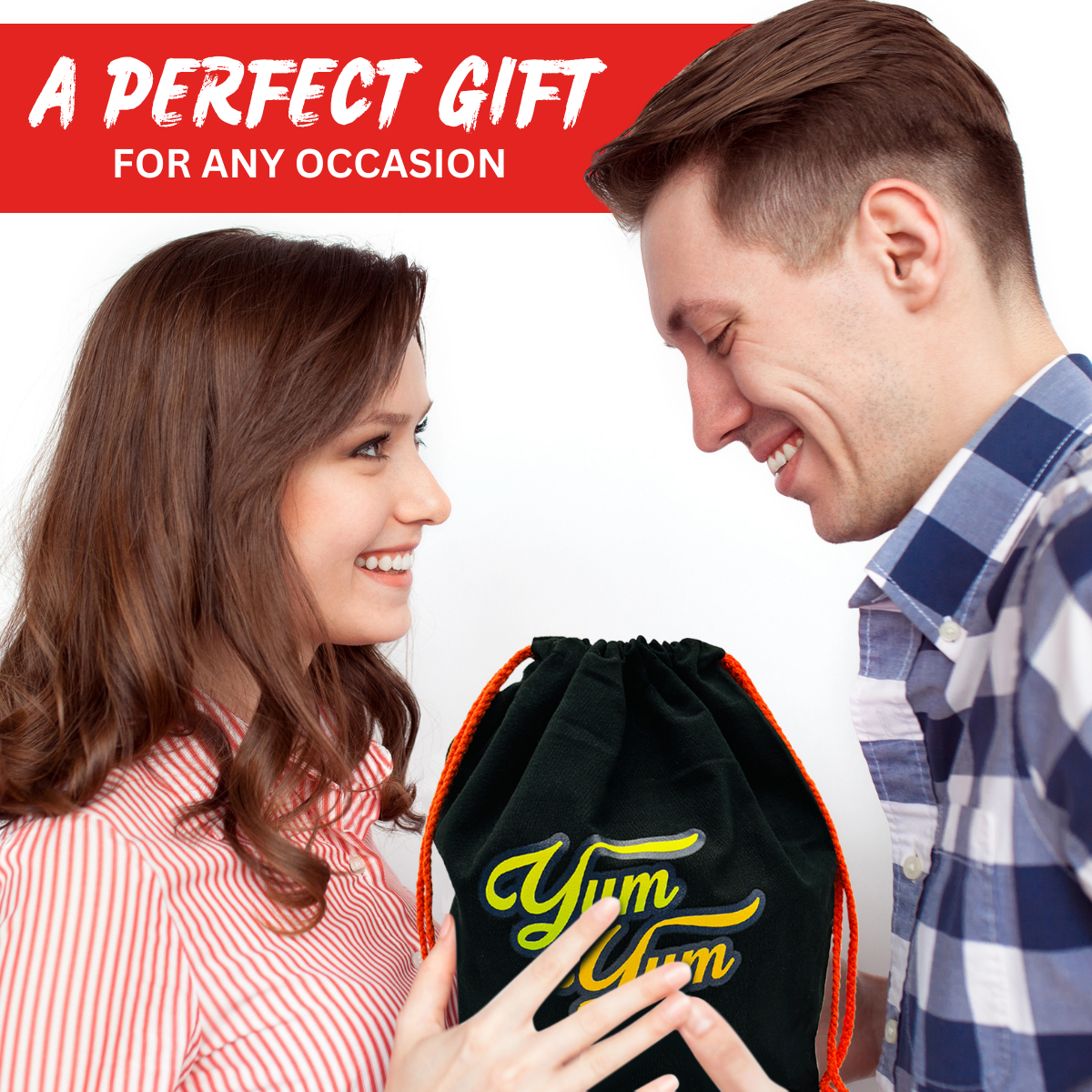 Woman gifting a Yum Yum Candy Shop freeze dried candy bag to a smiling man