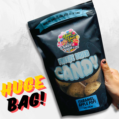 Large bag of freeze dried caramel apple pops being held in hand