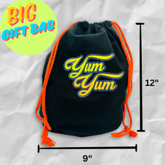 Large black drawstring gift bag with orange strings – 12 inches tall and 9 inches wide
