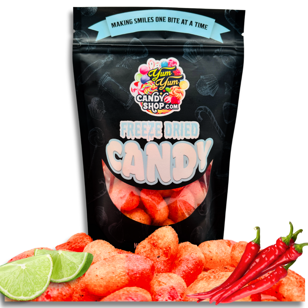 Freeze dried chamoy peach hearts in a Yum Yum Candy Shop bag with fresh lime and chili peppers