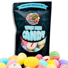 Freeze dried salt water taffy in assorted bright colors in a Yum Yum Candy Shop bag