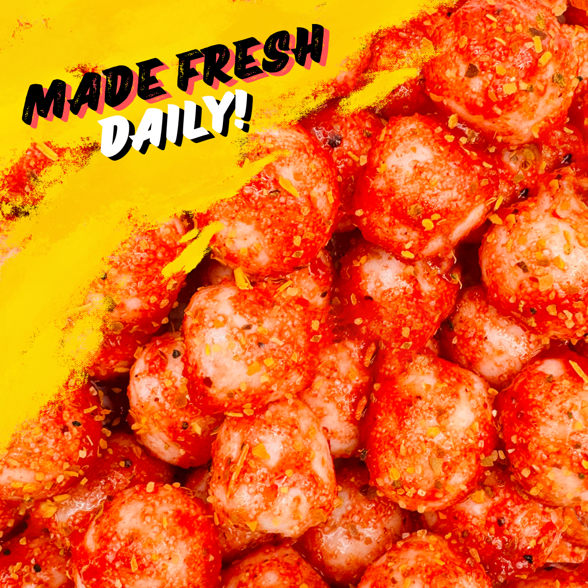Close-up of Chamoy Piña Colada Sours candy with “Made Fresh Daily” text, showing chamoy-coated pineapple-coconut sour candies.
