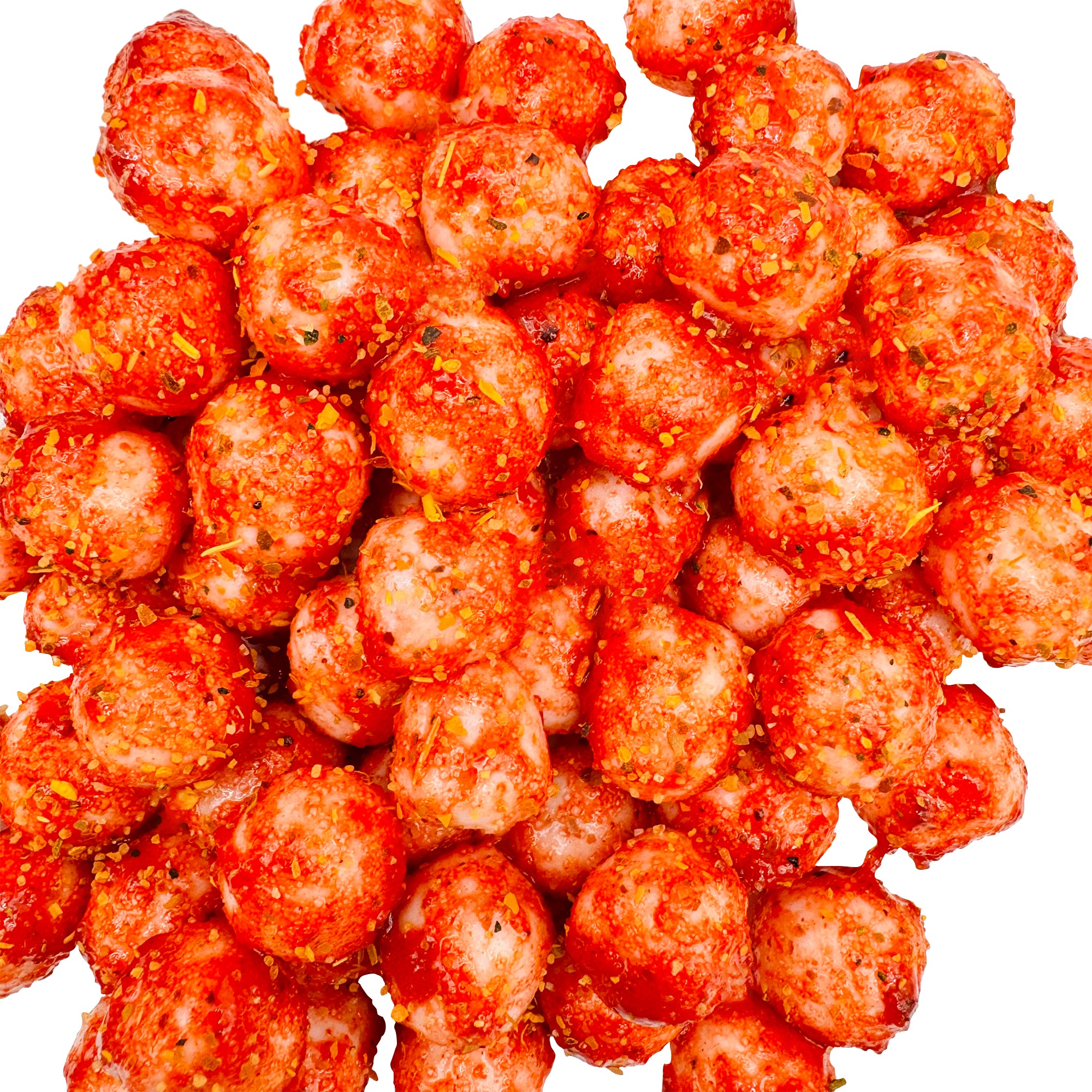 Pile of Chamoy Piña Colada Sours showing vibrant red chamoy coating over pineapple-coconut sour candies.