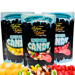 Three Yum Yum Candy Shop freeze dried candy bags with freeze dried candy pieces in front
