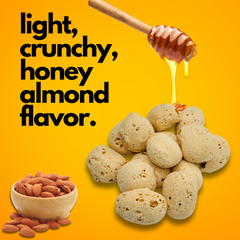 Close-up of light, crunchy Freeze-Dried Honey Almond Bits with honey drizzle and almonds.