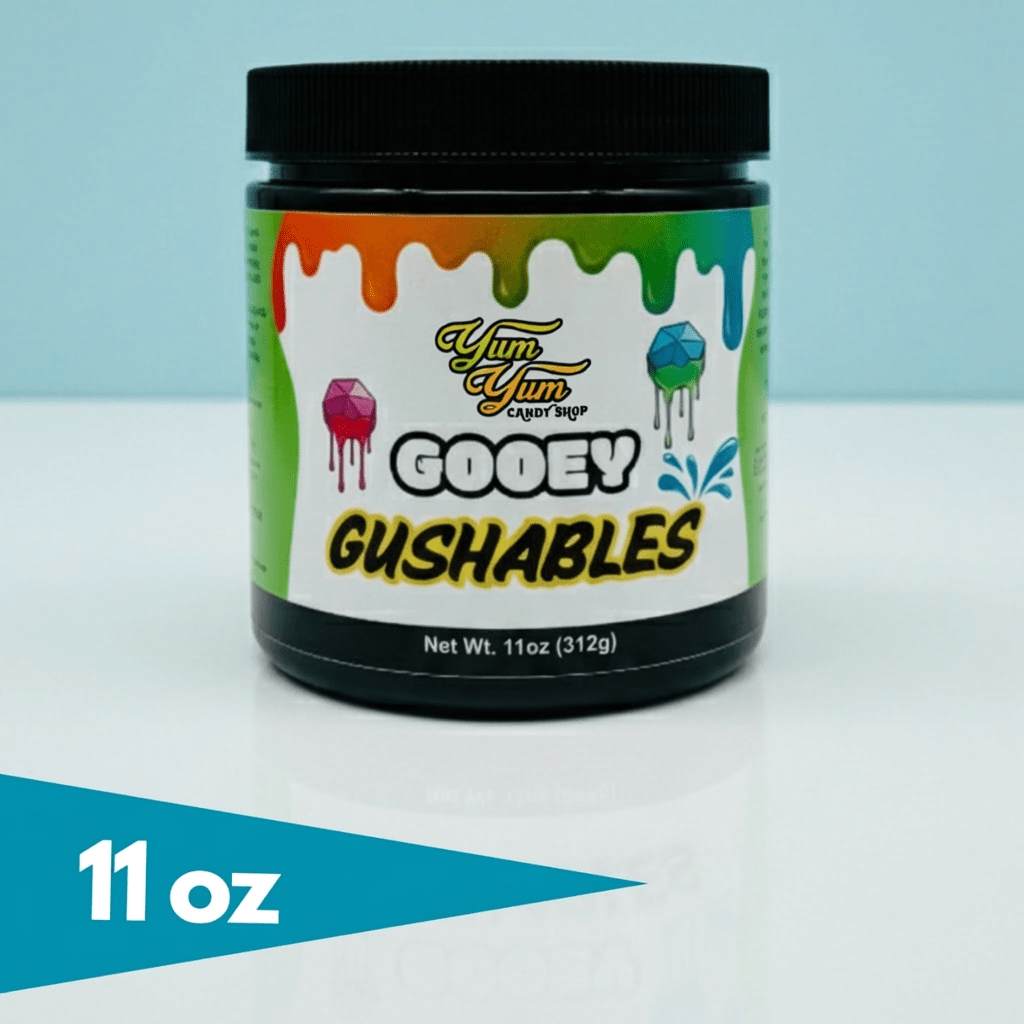11 ounce jar of Yum Yum Candy Shop Gooey Gushables liquid candy with black lid on light background