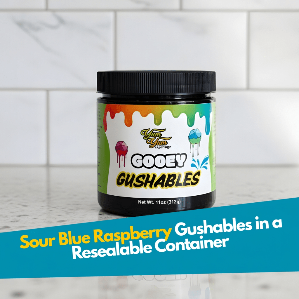 11 ounce jar of Yum Yum Candy Shop Sour Blue Raspberry Gooey Gushables liquid candy on light background