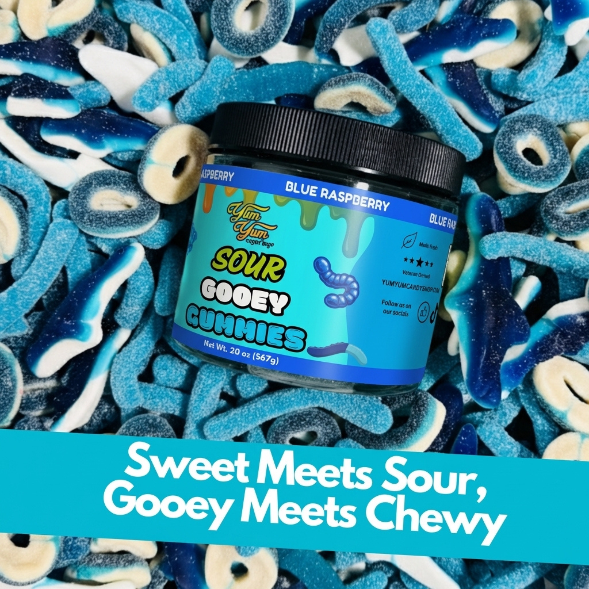 Jar of Sour blue raspberry gooey gummies surrounded by blue and white gummy candies