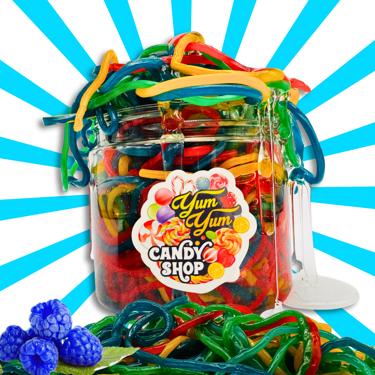 Jar of colorful candy spaghetti with 'Yum Yum Candy Shop' label on a blue and white striped background