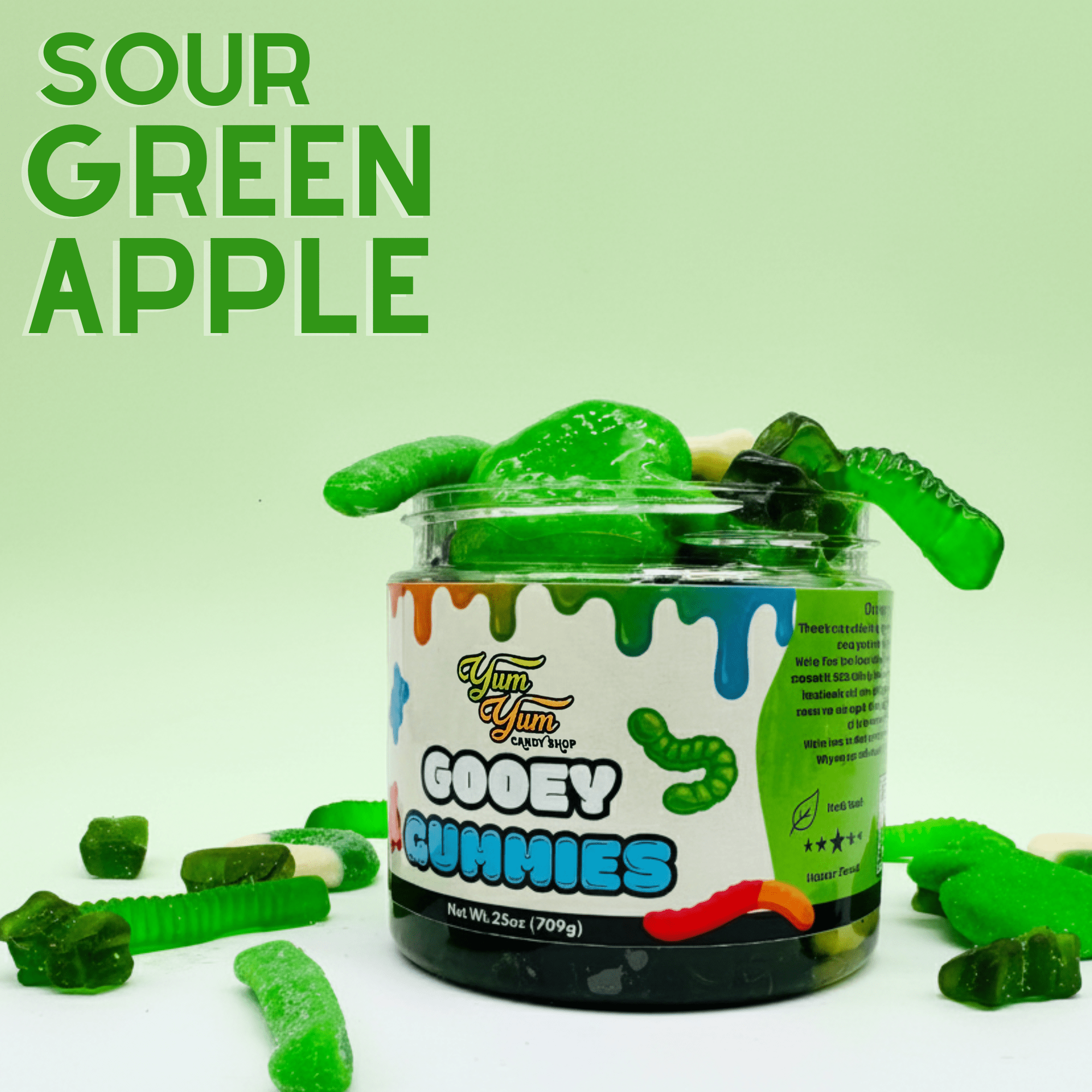 Jar of sour green apple gooey gummies with green gummy worms on a light green background