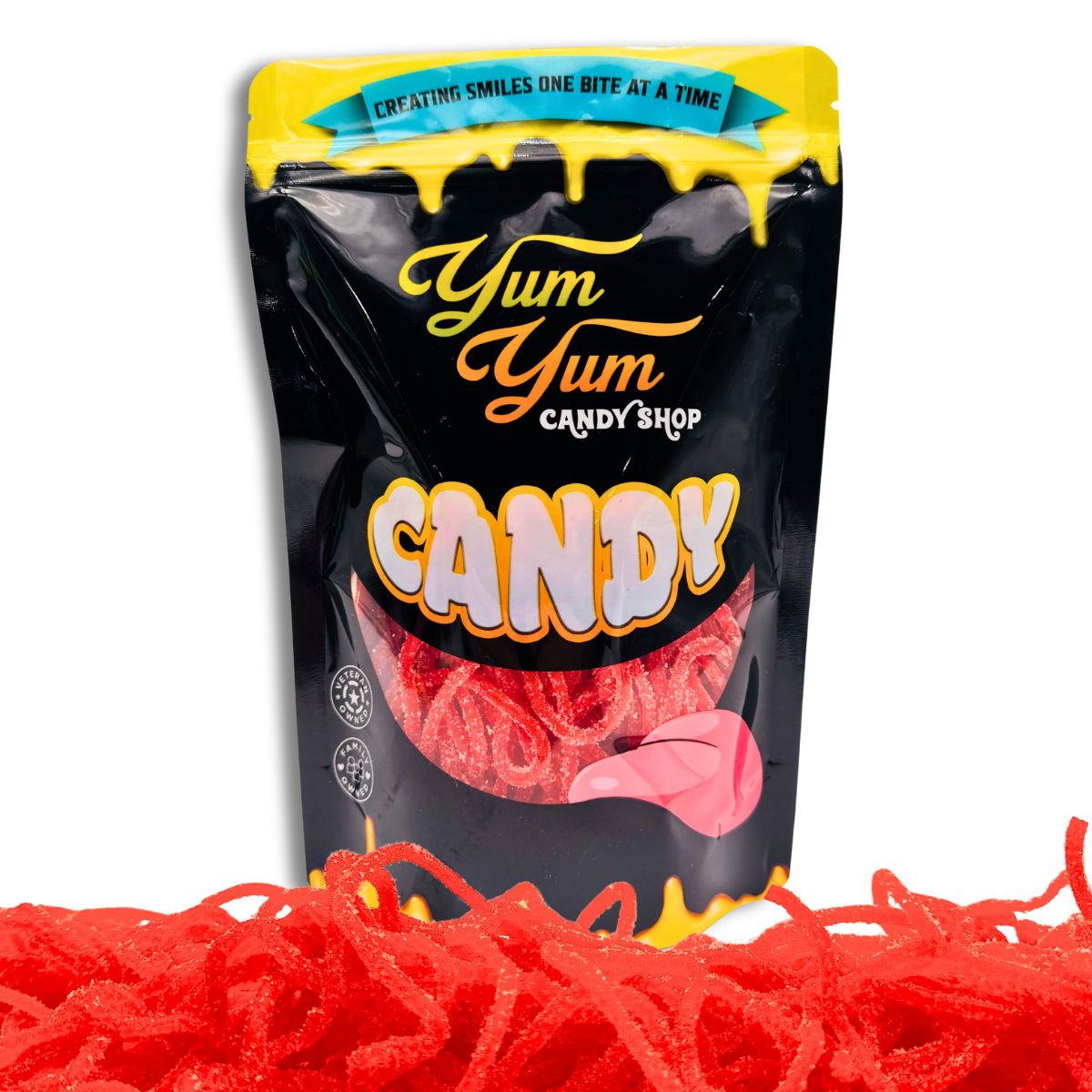 Sour Red strawberry licorice laces laid out in front of Yum Yum Candy Shop bag