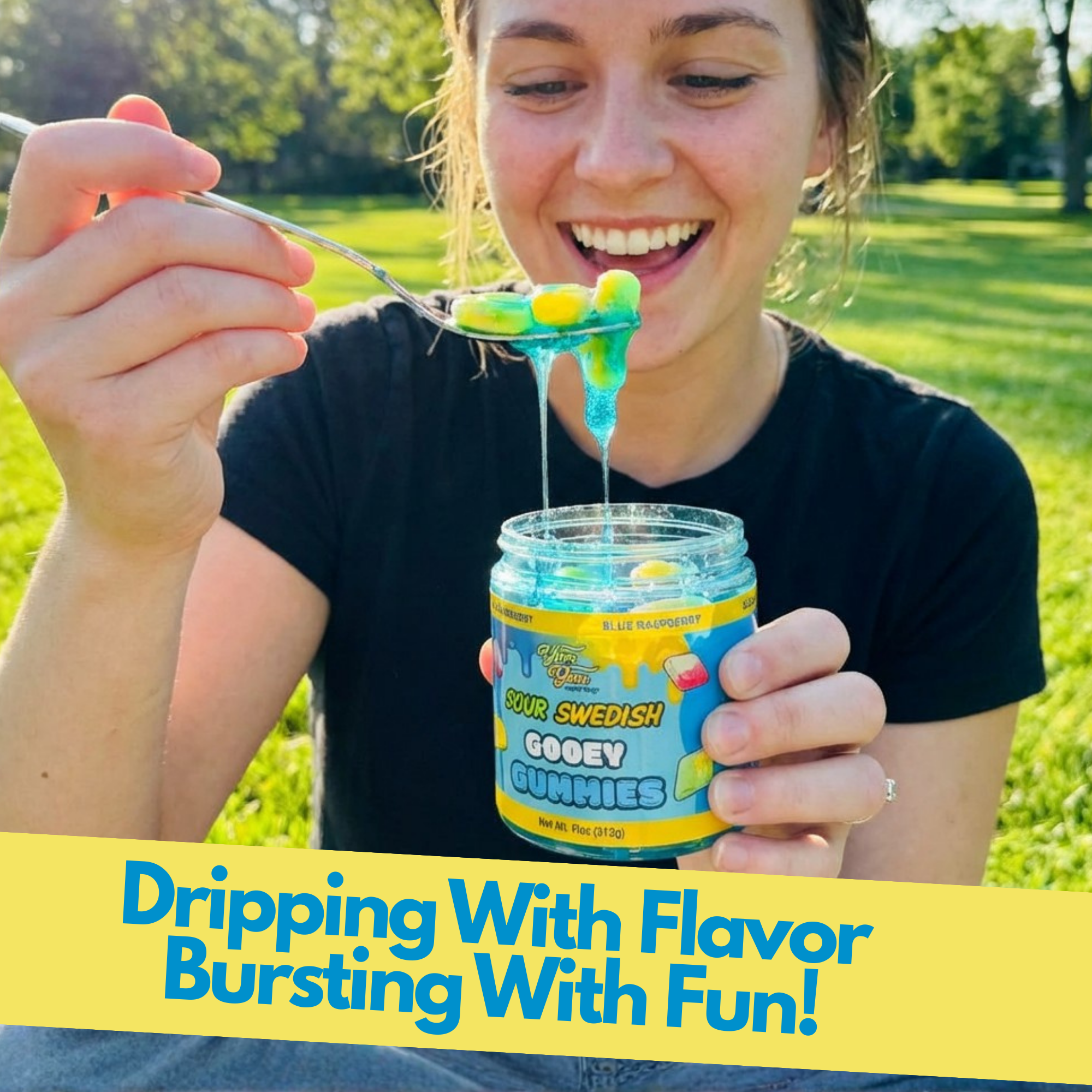 A woman outdoors smiling as she holds the jar and lifts a spoonful of the blue-syrup-covered gummies. Yellow text overlay reads: "Dripping With Flavor Bursting With Fun!"