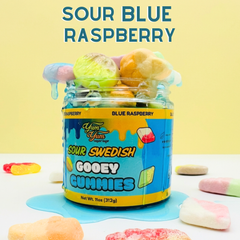 A centered product shot of a jar of gooey gummies against a pale yellow background