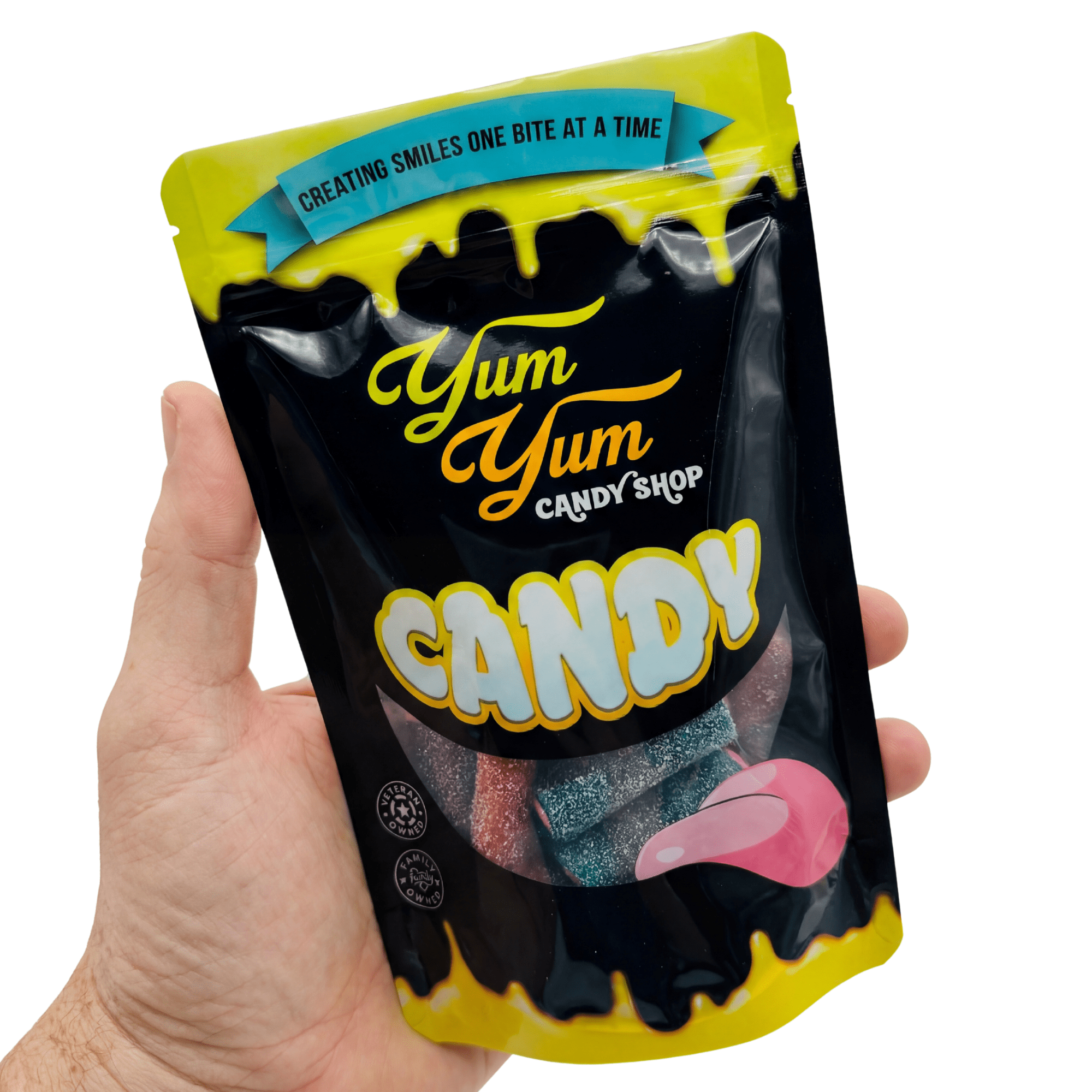 A hand holding a bag of Yum Yum Candy Shop Swedish licorice
