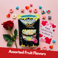 Ultimate Valentine’s Gummy Candy Mix surrounded by heart-shaped gummies and Valentine decorations on pink background